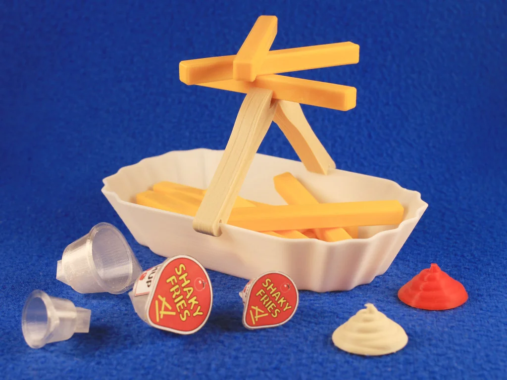 SHAKY FRIS — несбалансированная игра с балансировкой картофеля фри и чипсов.