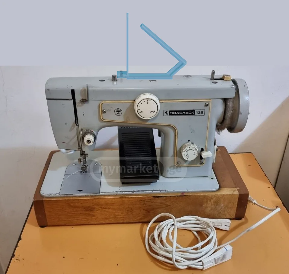 Держатель для катушек ниток