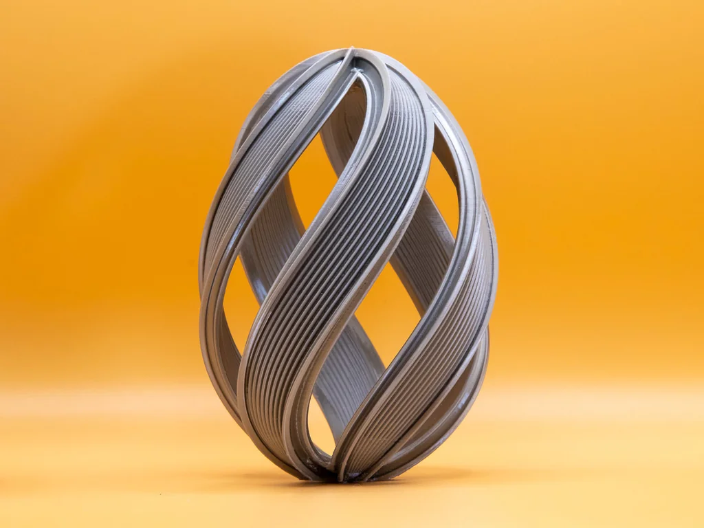 3D модель Модель Пасхального яйца 2026 с открытой спиральной лентой - фото 1