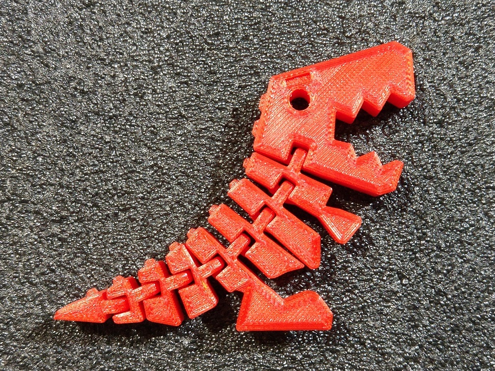 Гибкий динозавр Рекс с открытым ртом