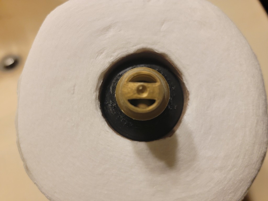 Фиксатор для рулонов туалетной бумаги