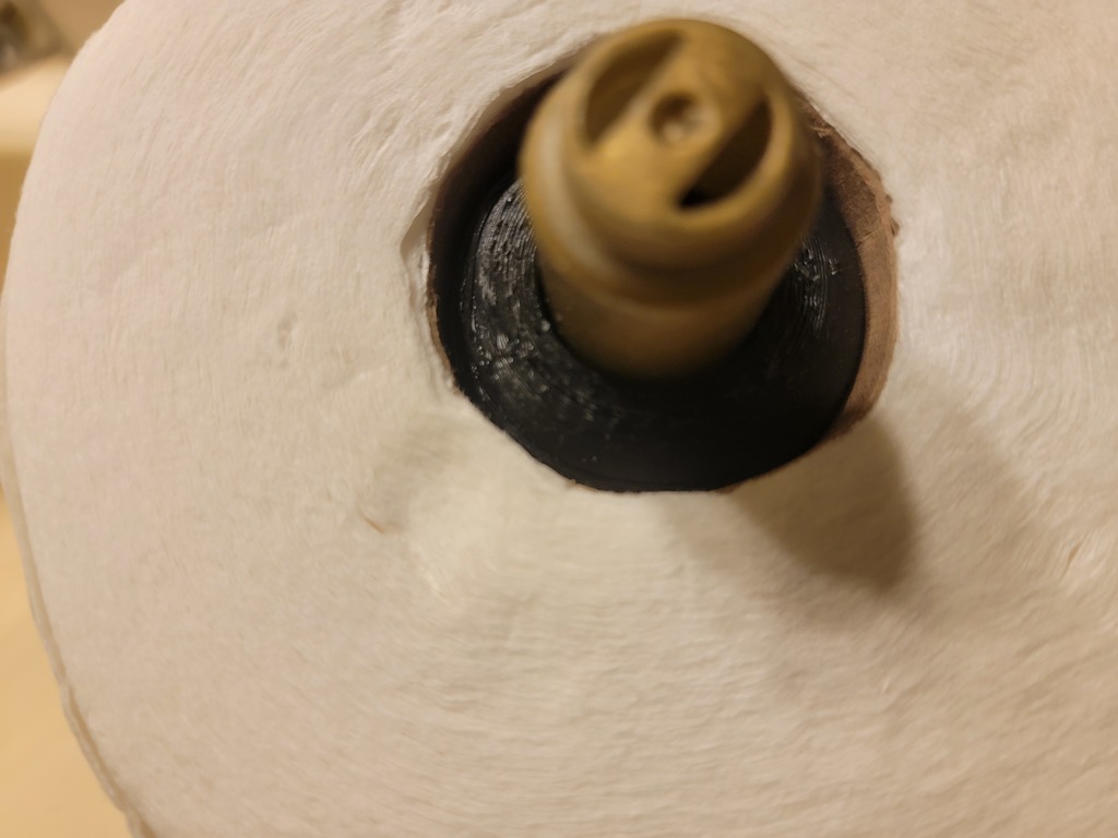 Фиксатор для рулонов туалетной бумаги