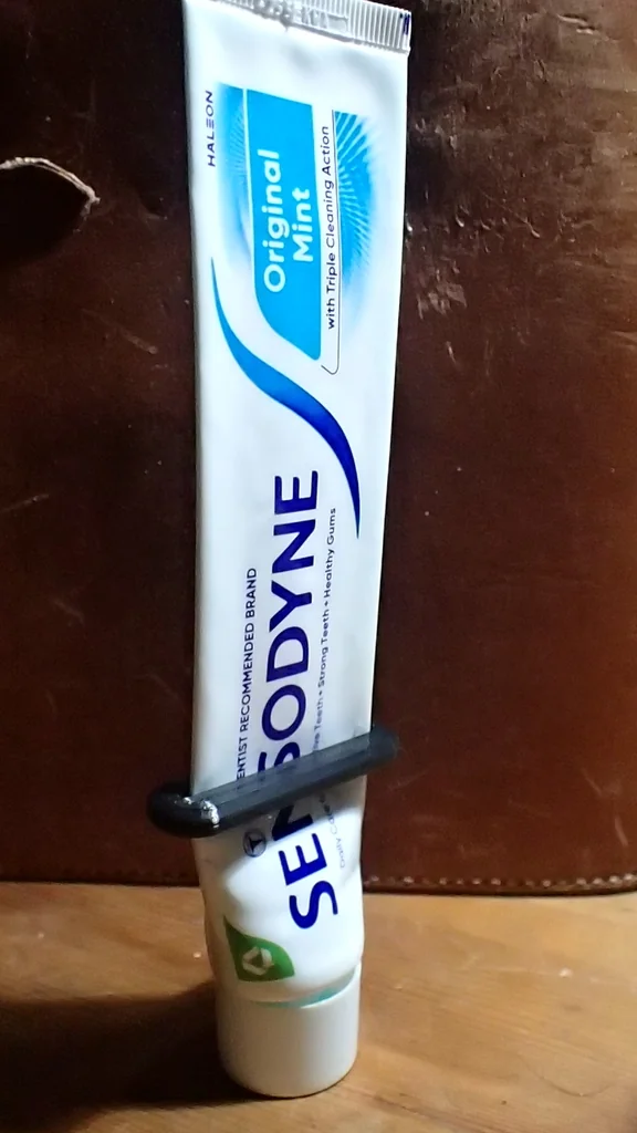 Держатель тюбиков для зубной пасты