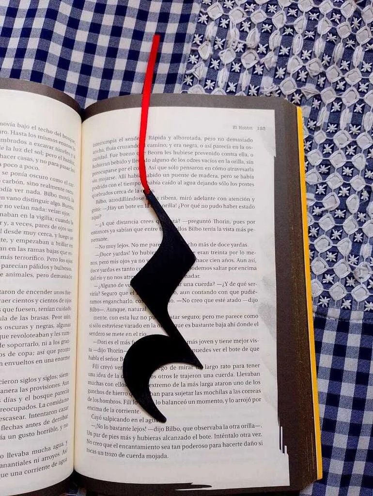 Закладка в форме музыкального символа паузы