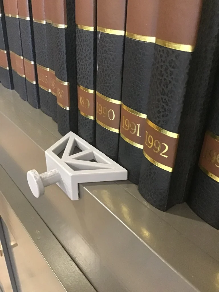 Book Spacer для равномерного расположения книг