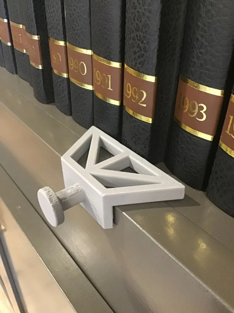 Book Spacer для равномерного расположения книг