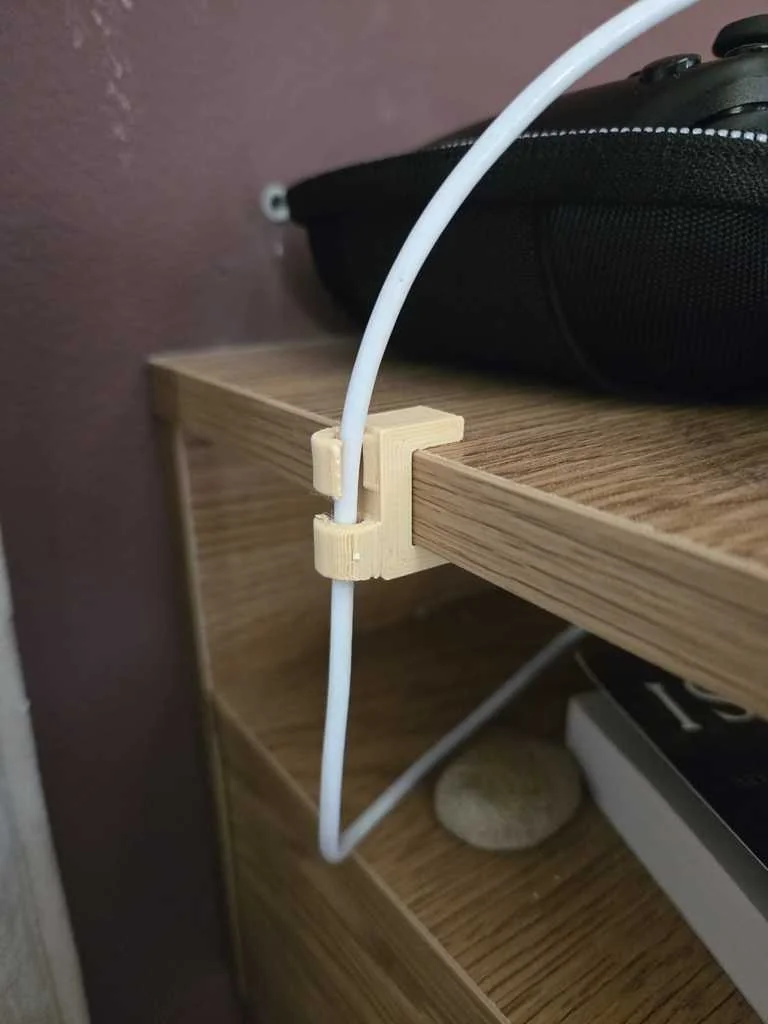 Зажим для кабелей для тумбочки