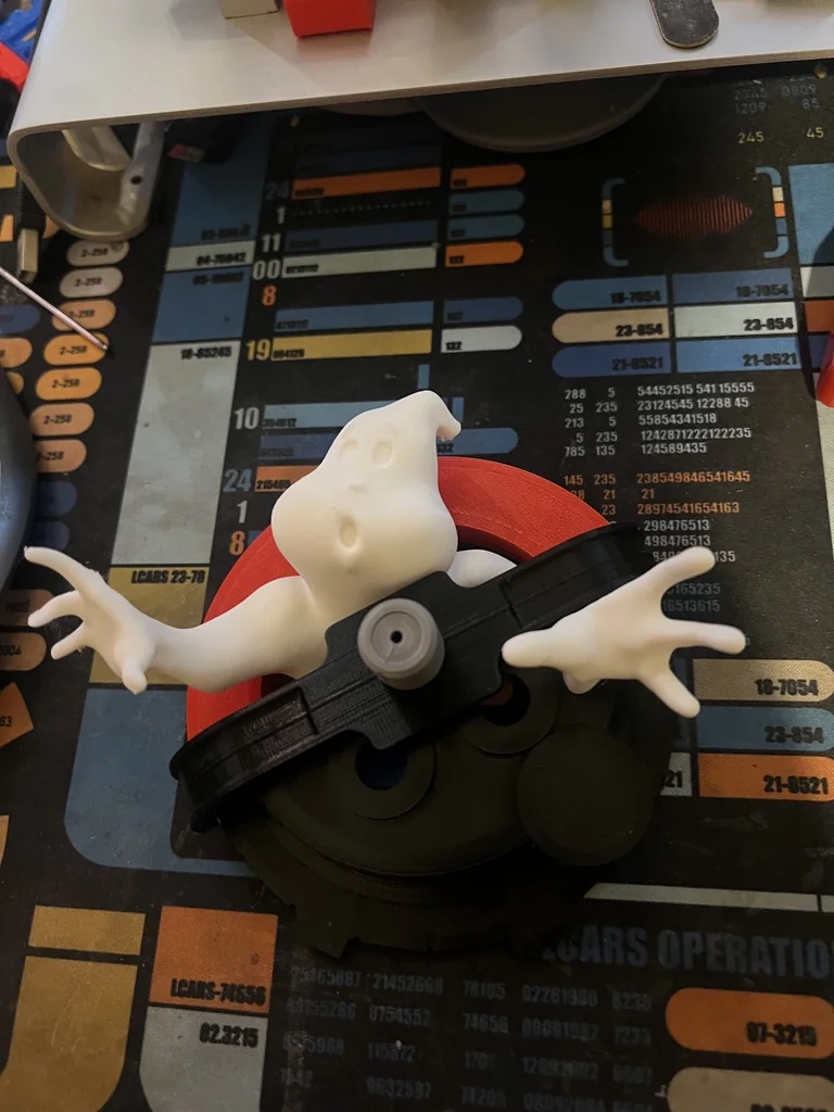 Логотип Ghostbusters с циклотронами