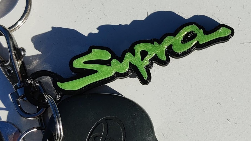 Логотип Supra в виде Брелока