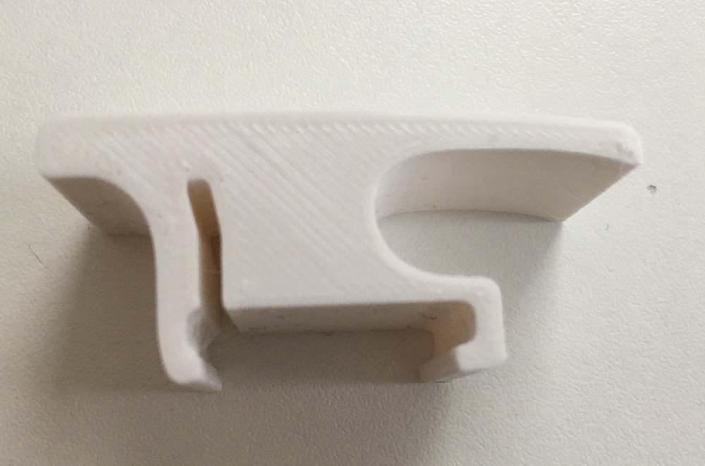 Пластиковый крючок для системы Flex Organizer в Opel Astra