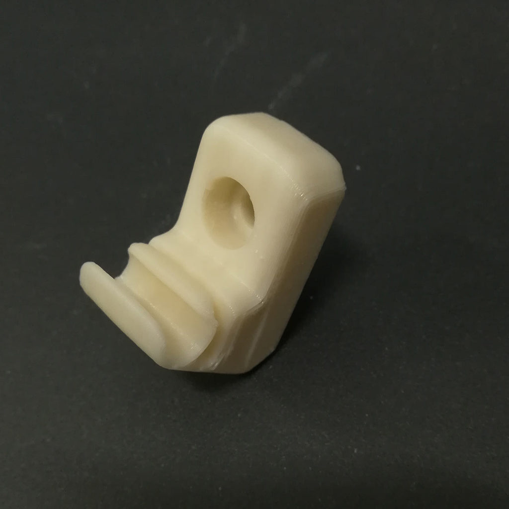 Поддержка замка солнцезащитного козырька с водительской стороны