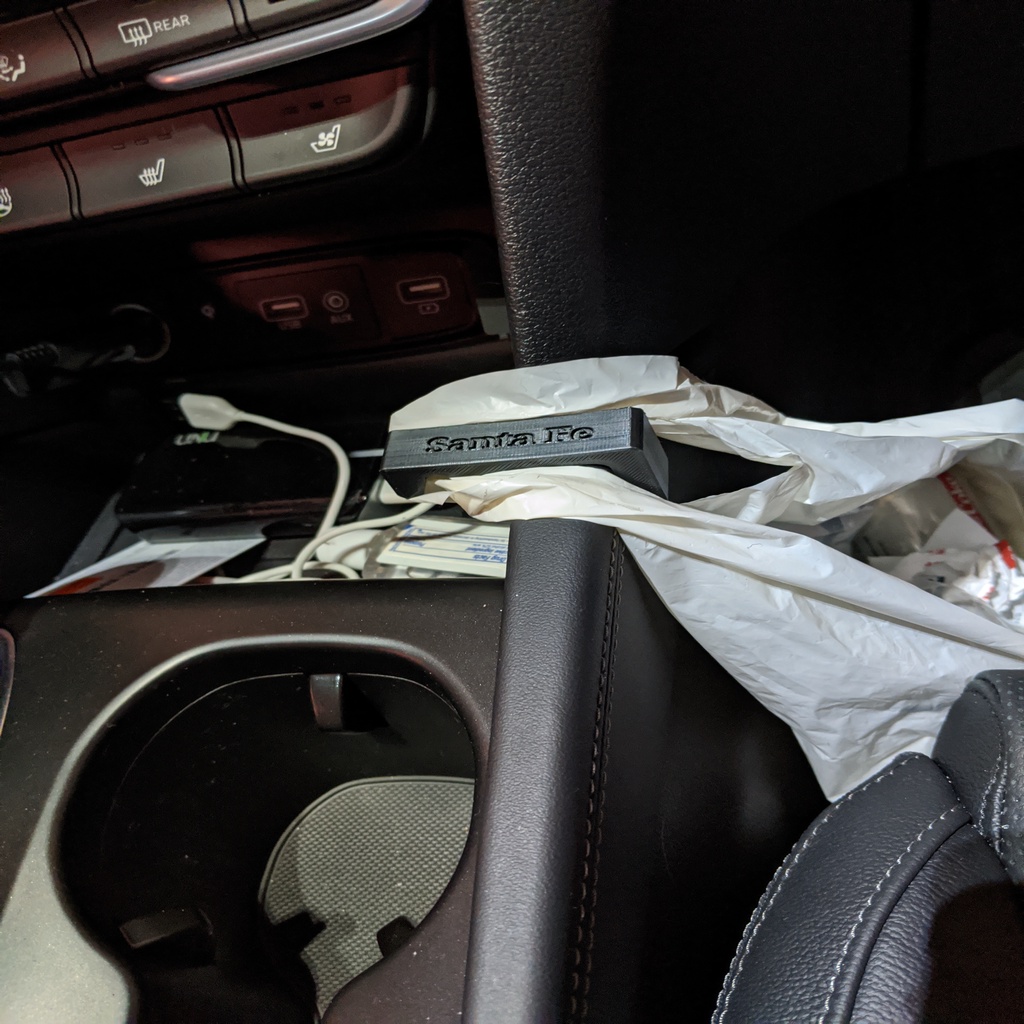 Клипса для мусорного пакета в Hyundai Santa Fe