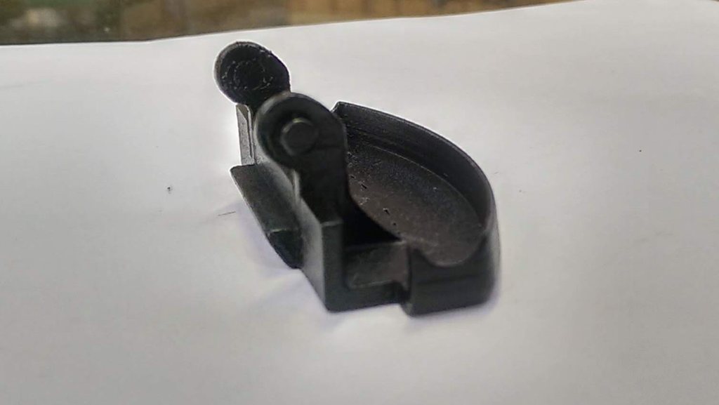 Зажим подлокотника центральной консоли