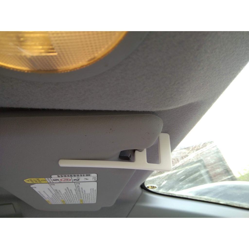 Ручной держатель для дефектного солнцезащитного козырька в Mitsubishi Colt