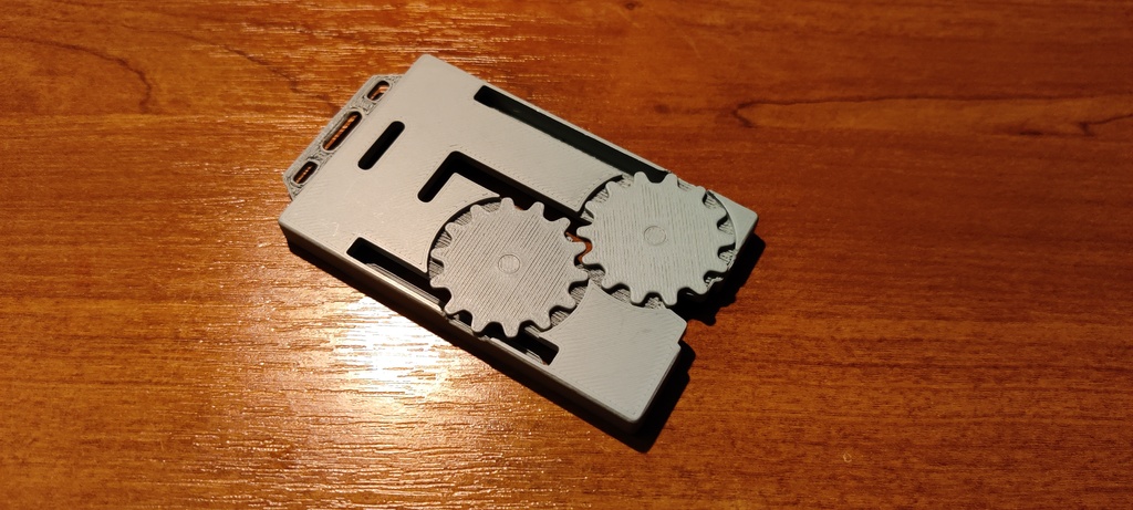 Держатель ключ-карты с вращающимися шестеренками