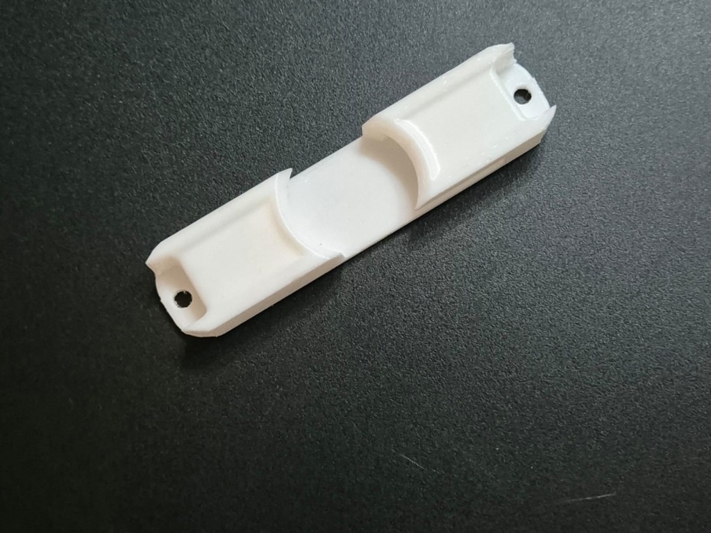 Универсальный держатель для рыболовных катушек