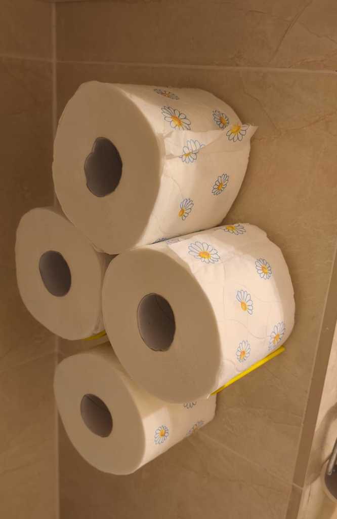 Компактный держатель для туалетной бумаги