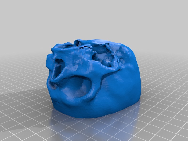 Скульптурная копилка в форме черепа